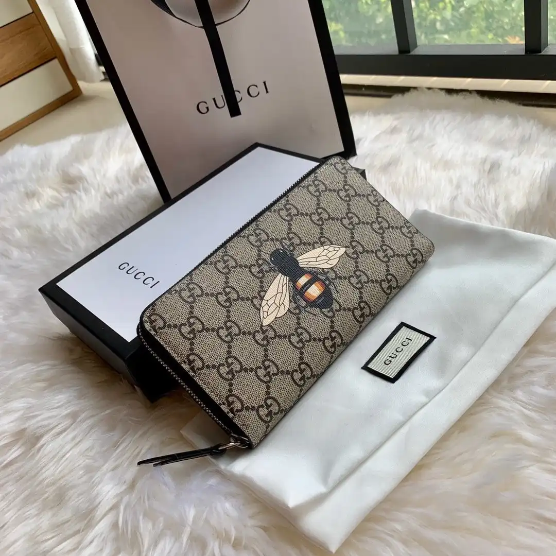 GUCCI Bee print GG zip around wallet