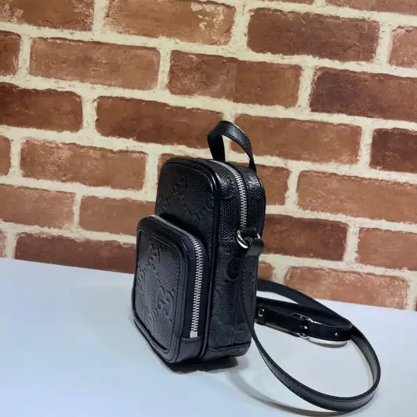 First bag ru GUCCI GG embossed mini bag