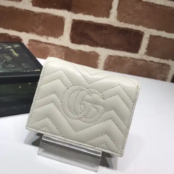 First bag ru GUCCI GG Marmont card case wallet