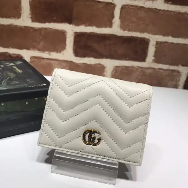 First bag ru GUCCI GG Marmont card case wallet