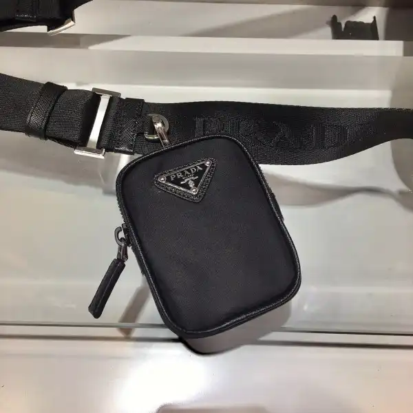 First bag ru PRADA Re-Nylon and Saffiano leather shoulder bag