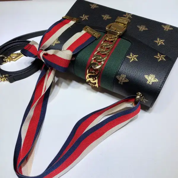 First bag ru GUCCI Sylvie Bee Star small shoulder bag