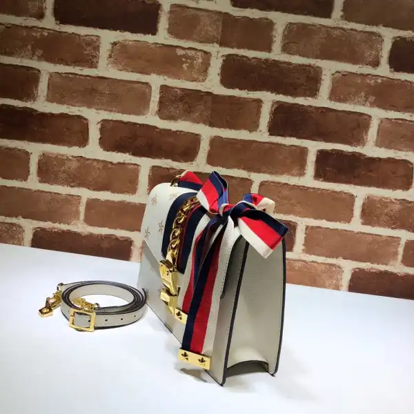 First bag ru GUCCI Sylvie Bee Star small shoulder bag