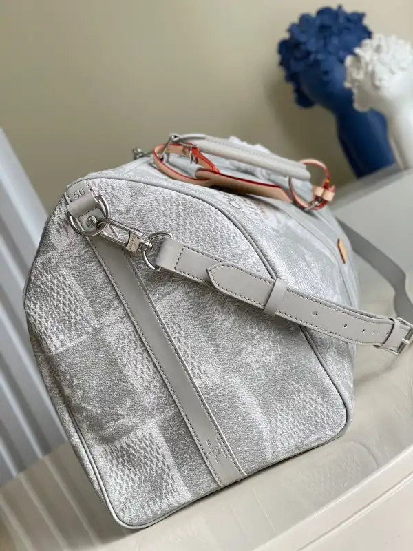 First bag ru LOUIS VUITTON KEEPALL BANDOULIÈRE 50