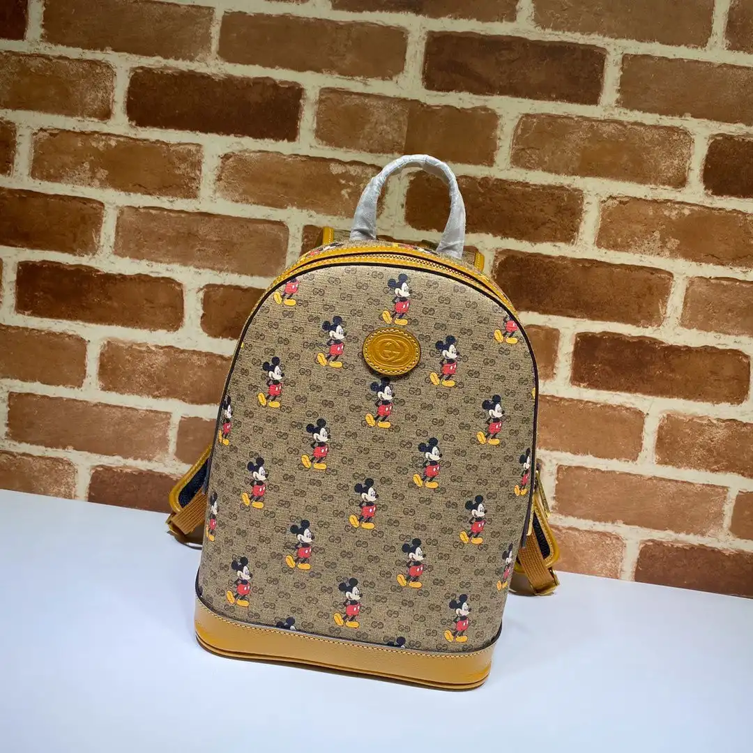 First bag ru GUCCI Disney x Gucci small backpack