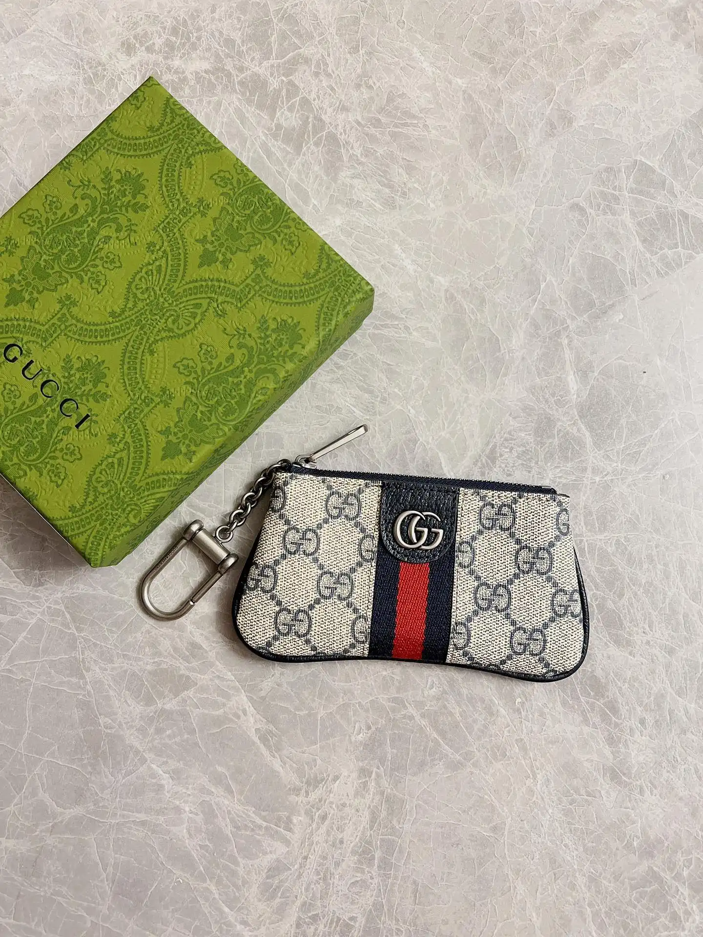 First bag ru Gucci GG Marmont matelassé key case