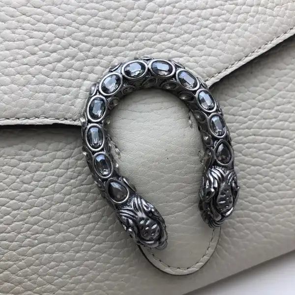 First bag ru Gucci Dionysus mini leather chain bag