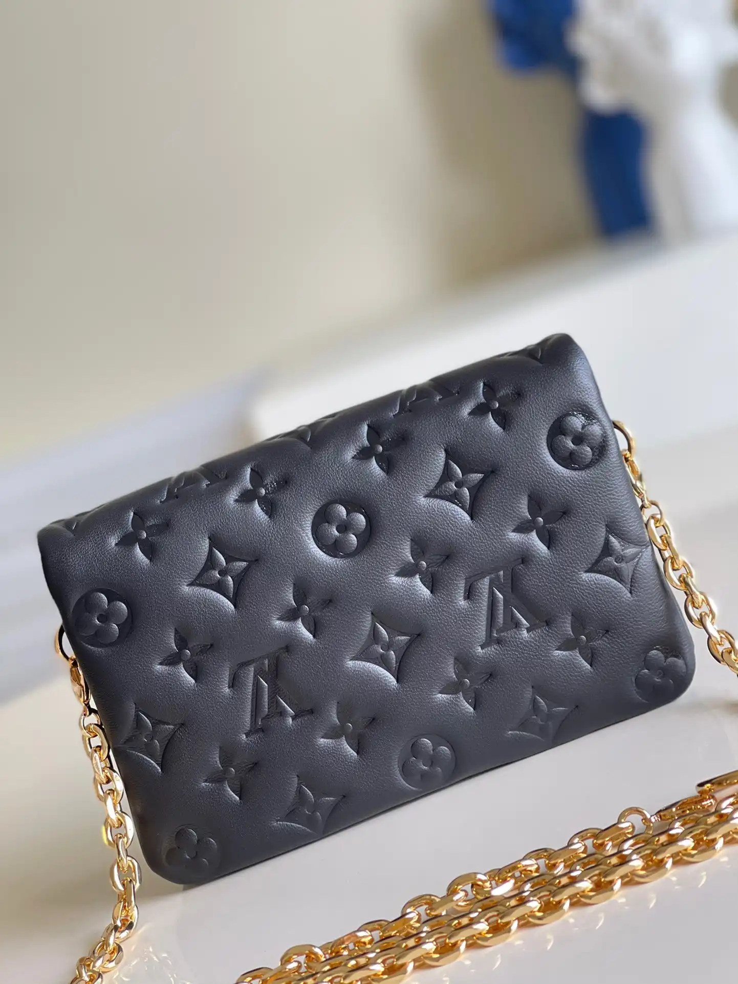 LOUIS VUITTON POCHETTE COUSSIN