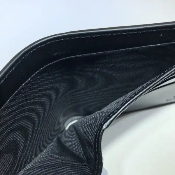 GUCCI GG embossed wallet