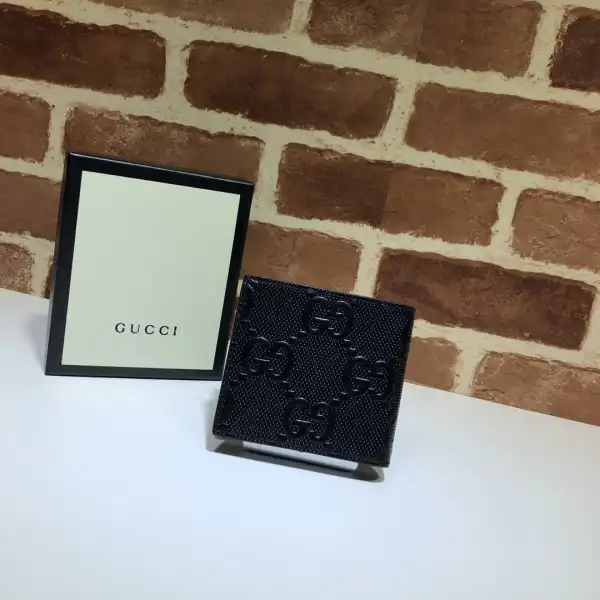 First bag ru GUCCI GG embossed wallet