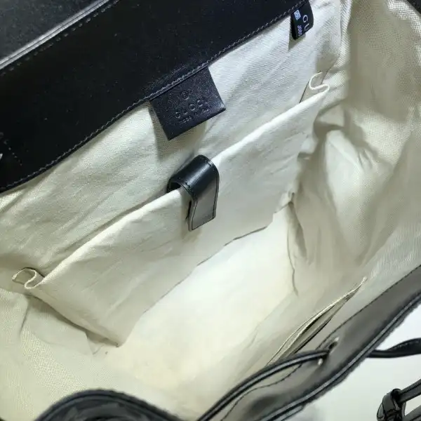 First bag ru GUCCI GG embossed backpack