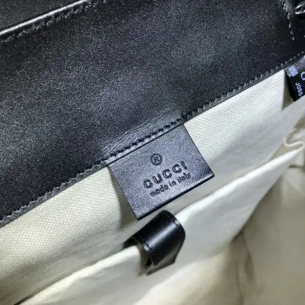 First bag ru GUCCI GG embossed backpack