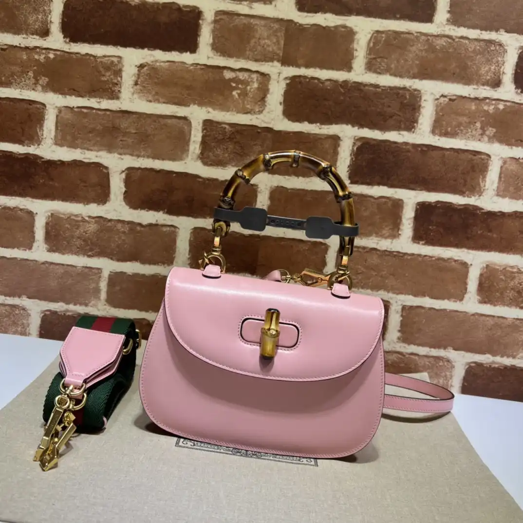 First bag ru Gucci Small top handle bag with Bamboo