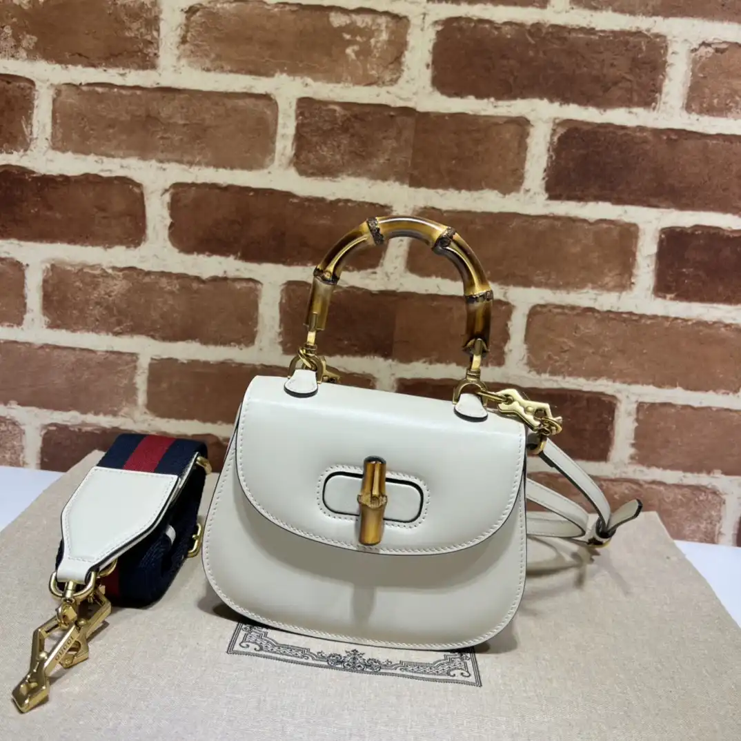 First bag ru GUCCI Mini top handle bag with Bamboo