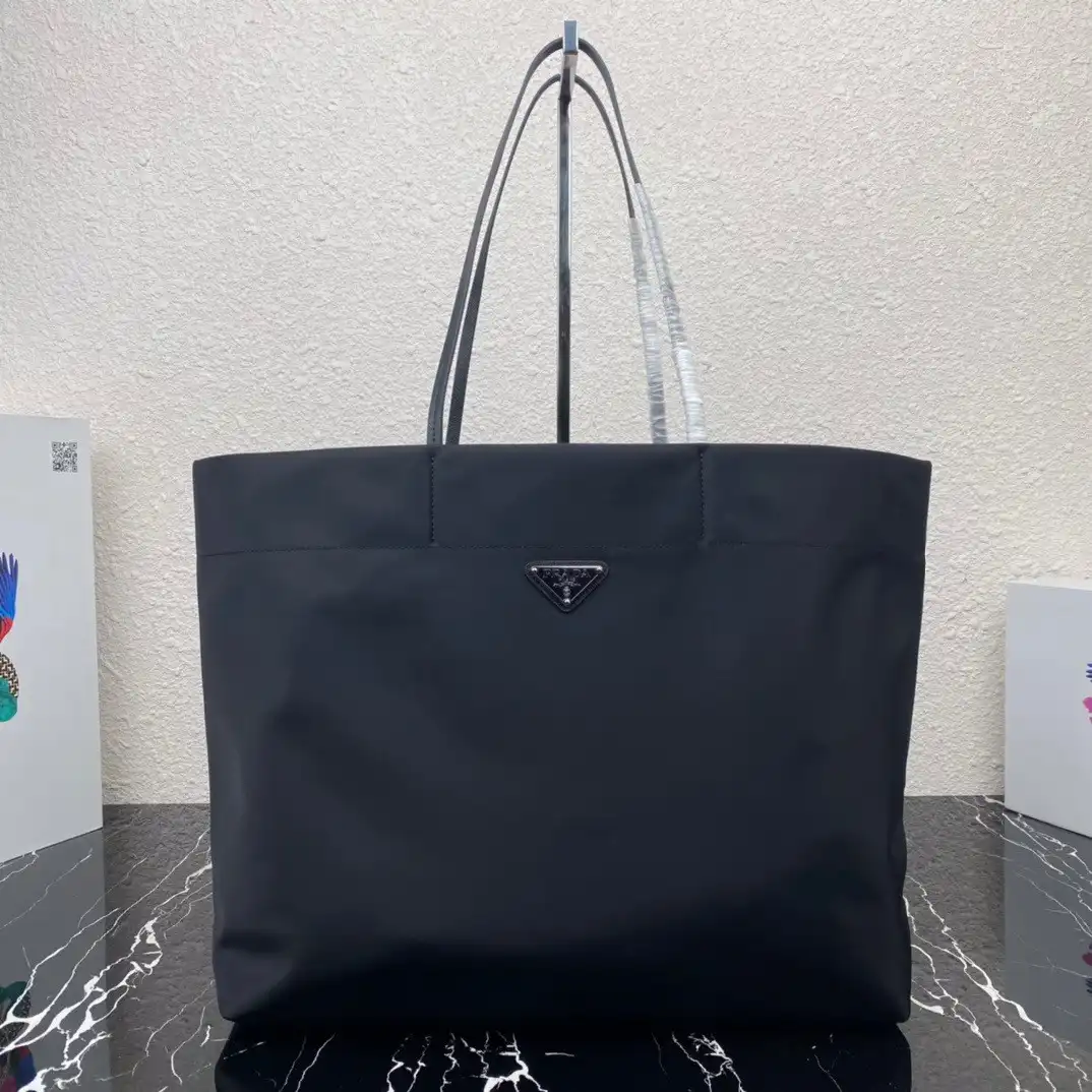 First bag ru PRADA Re-Nylon and Saffiano leather tote bag