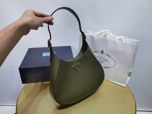 First bag ru Prada Leather shoulder bag