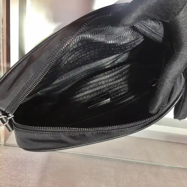 First bag ru PRADA Re-Nylon and Saffiano leather shoulder bag