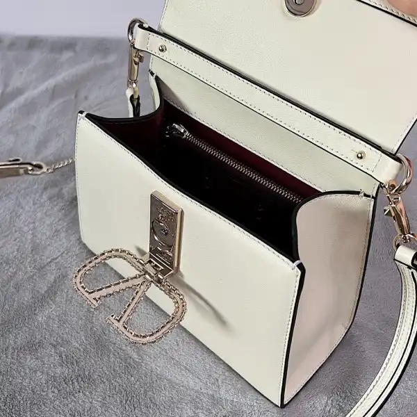 VALENTINO SMALL VSLING GRAINY CALFSKIN HANDBAG