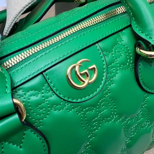 First bag ru GUCCI GG matelassé leather top handle bag