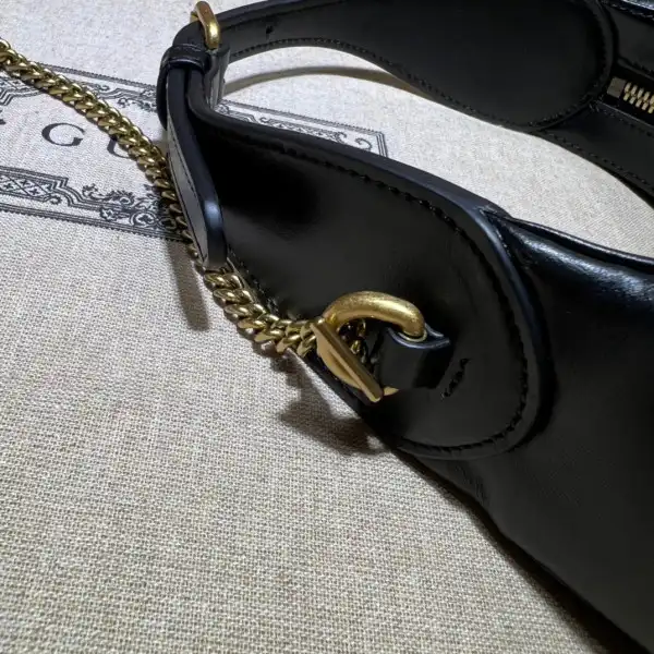 Frstbag ru GUCCI GG Marmont half-moon-shaped mini bag