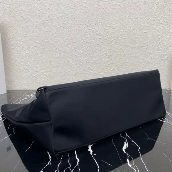 First bag ru PRADA Re-Nylon and Saffiano leather tote bag