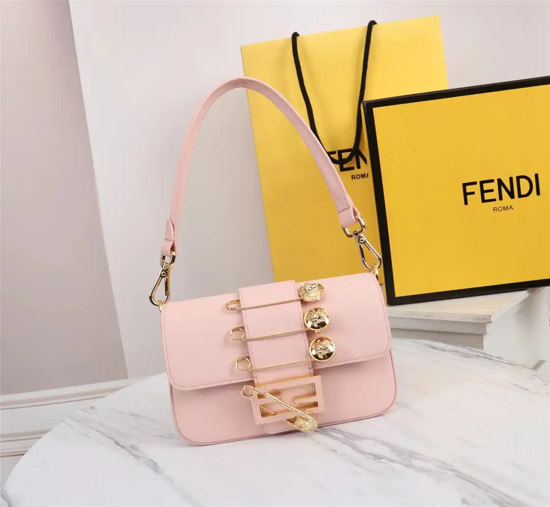 First bag ru FENDI Brooch mini baguette