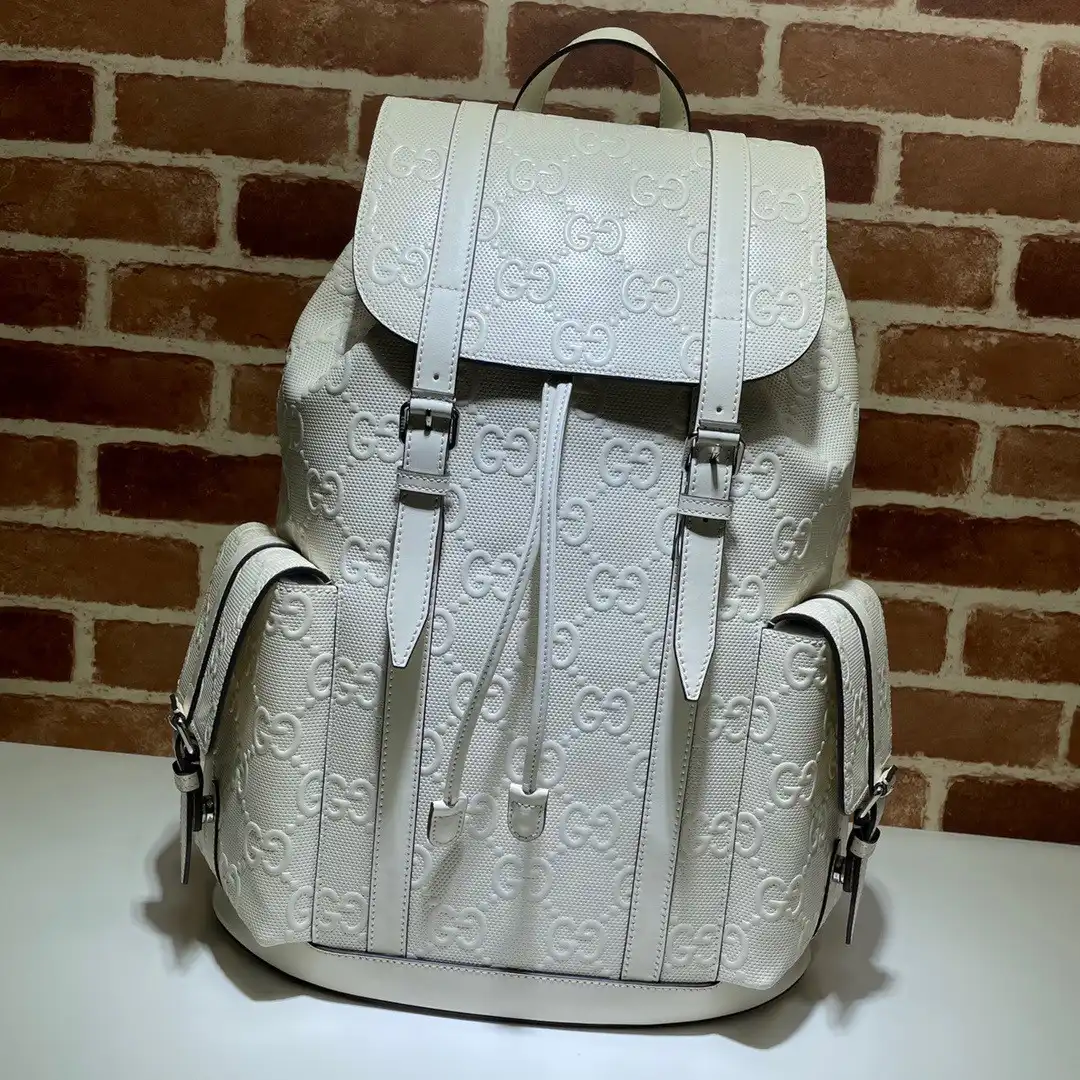 First Bag Ru GUCCI GG embossed backpack