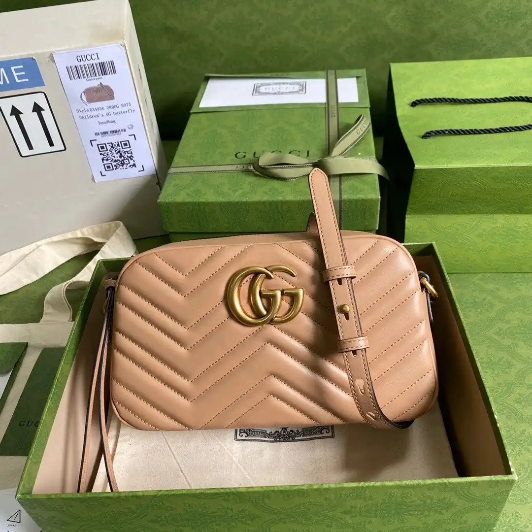 First bag ru GUCCI GG Marmont small shoulder bag