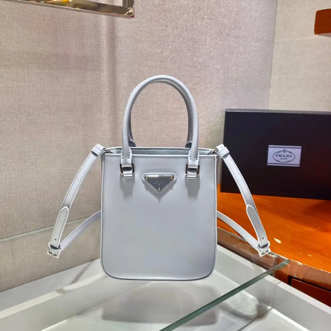 First bag ru PRADA Small brushed leather tote