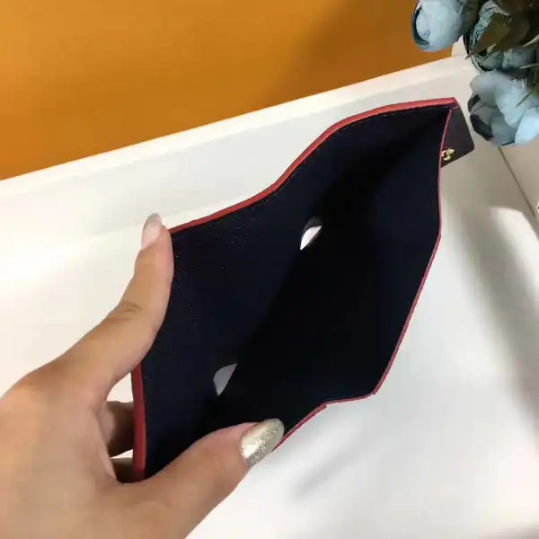 TO Louis Vuitton Victorine wallet