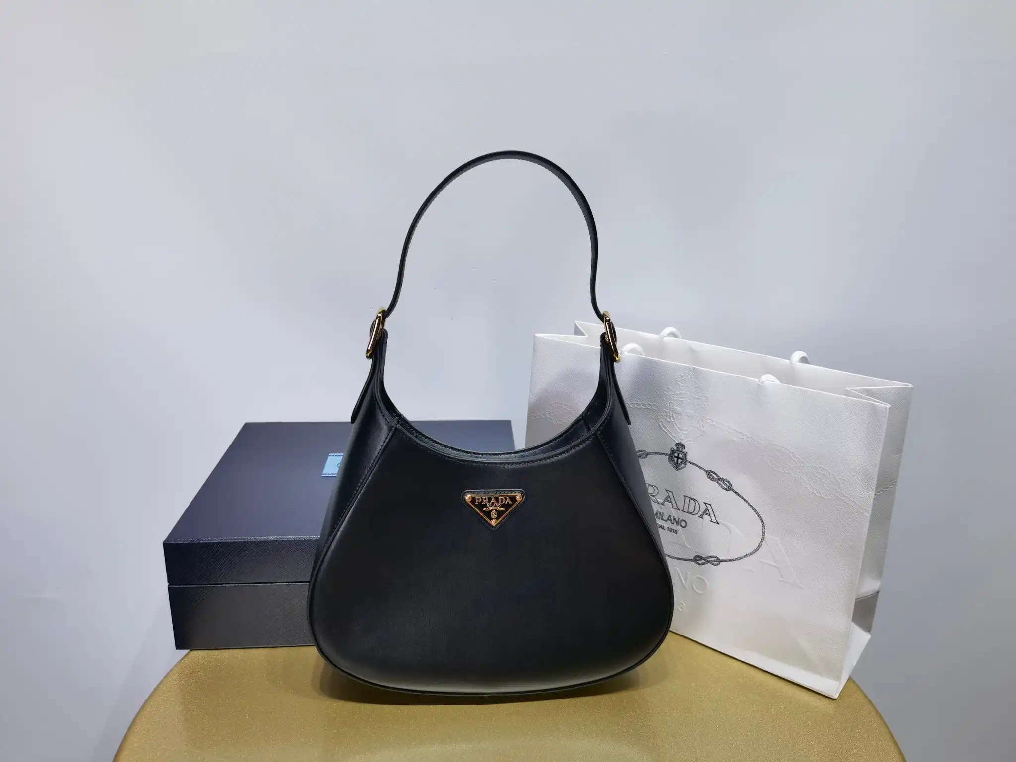 First bag ru Prada Leather shoulder bag