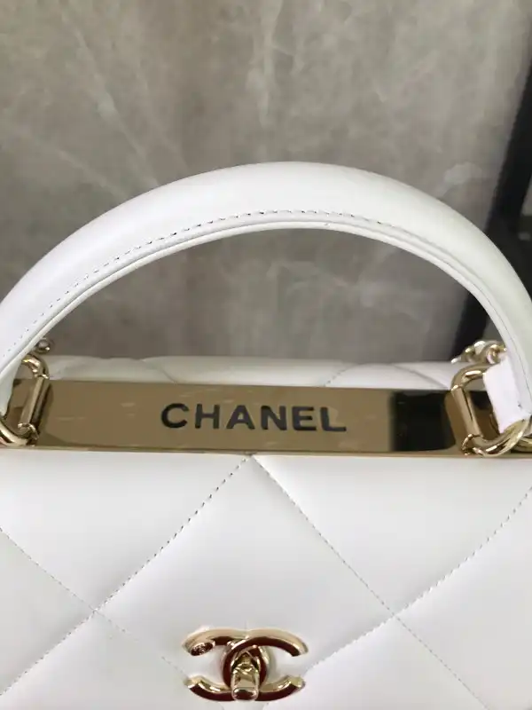 CHANEL FLAP BAG WITH TOP HANDLE