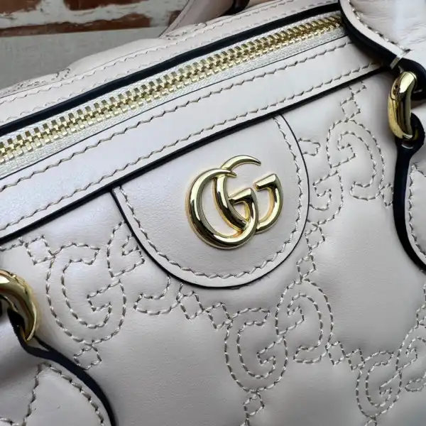 GUCCI GG matelassé leather top handle bag