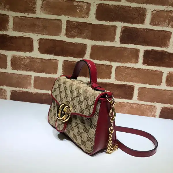 First bag ru GUCCI GG Marmont mini top handle bag