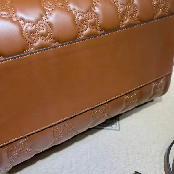 GUCCI GG matelassé leather top handle bag