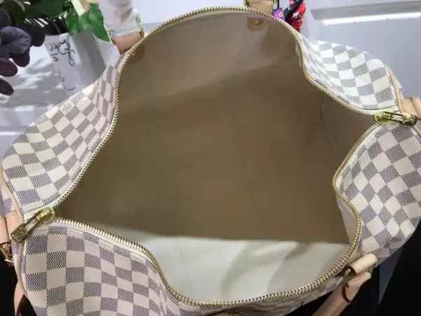 First bag ru LOUIS VUITTON KEEPALL BANDOULIÈRE 50