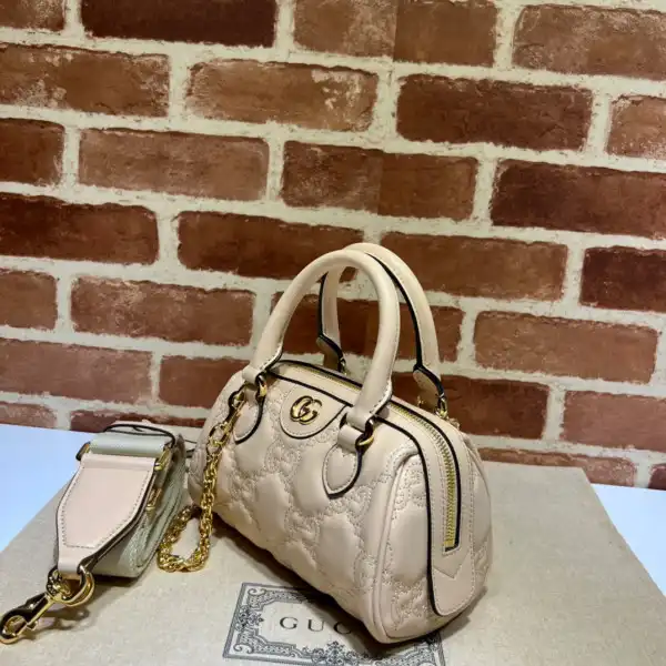 GUCCI GG matelassé leather top handle bag