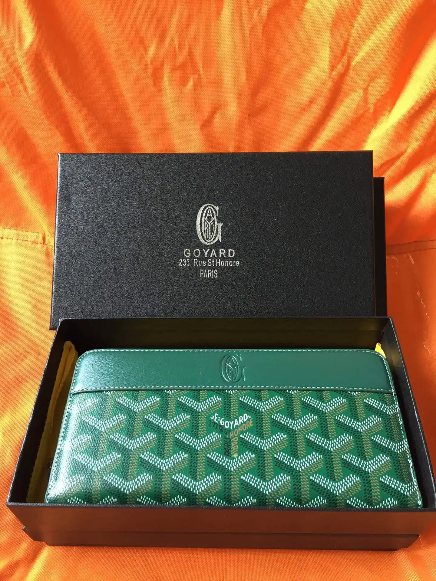 First bag ru GOYARD ZIPPY WALLET