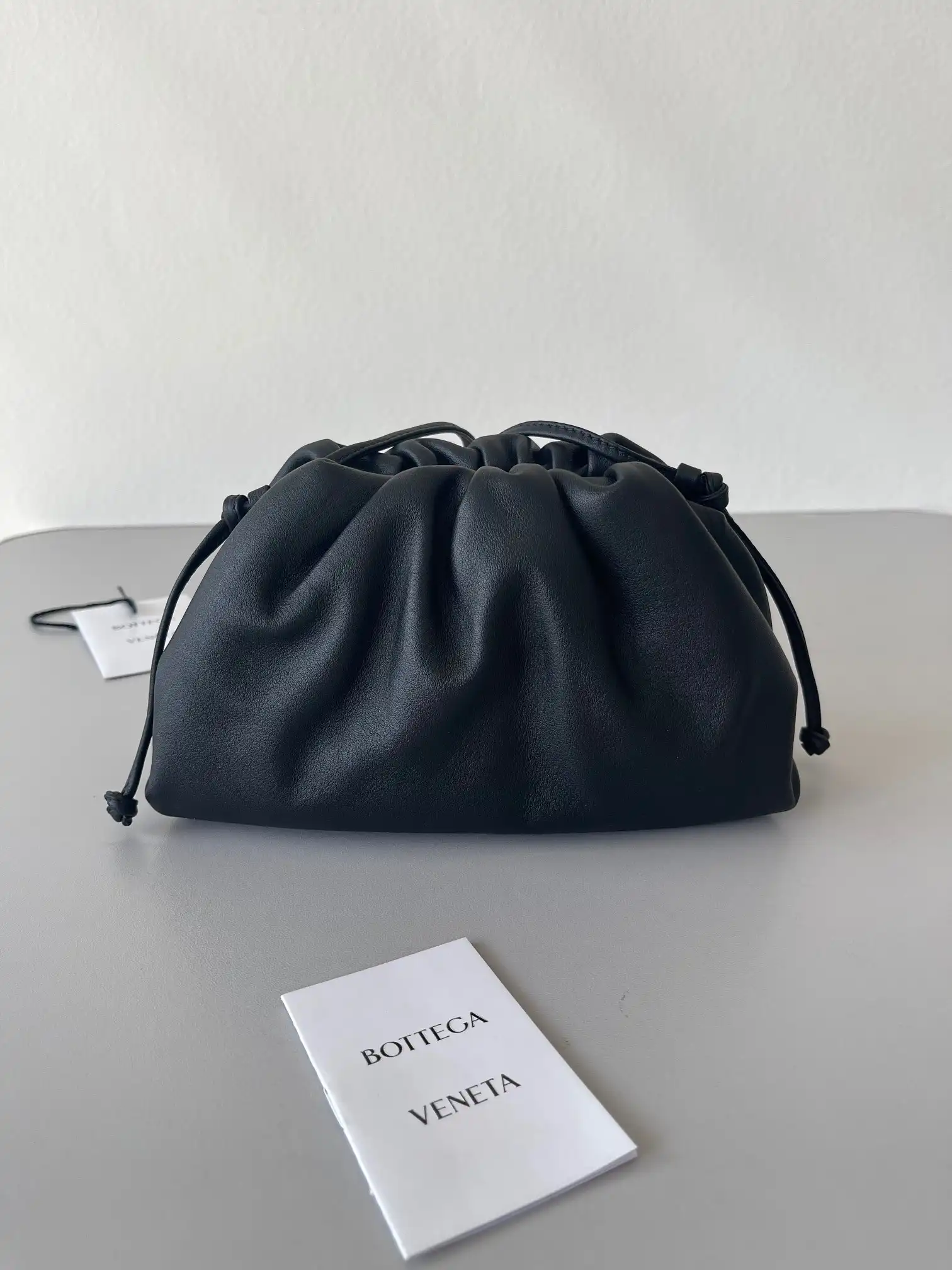 First bag ru BOTTEGA VENETA MINI POUCH