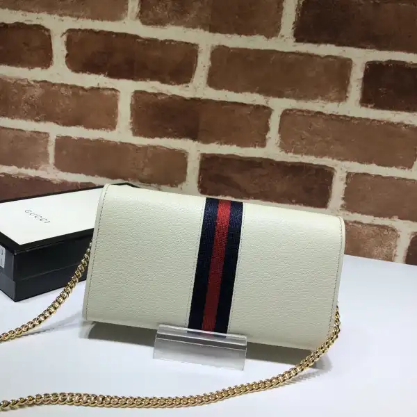 First bag ru GUCCI Ophidia GG chain wallet