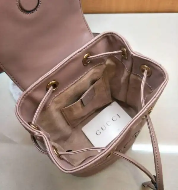 First bag ru Gucci GG Marmont matelassé backpack 528129