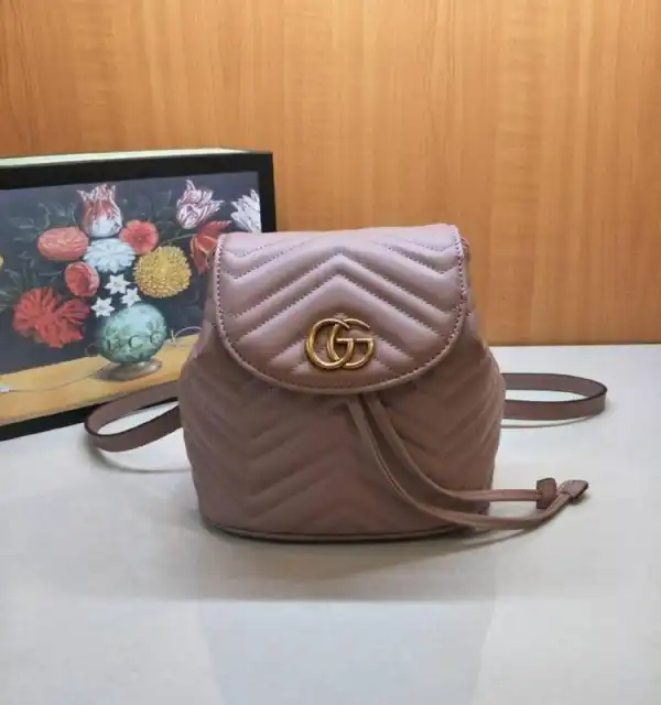 First bag ru Gucci GG Marmont matelassé backpack 528129