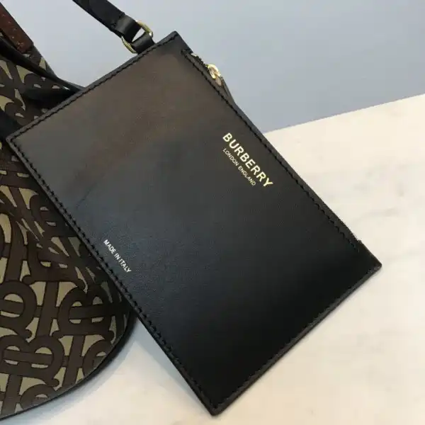 First bag ru BURBERRY Small Monogram E-canvas Peggy Bucket Bag