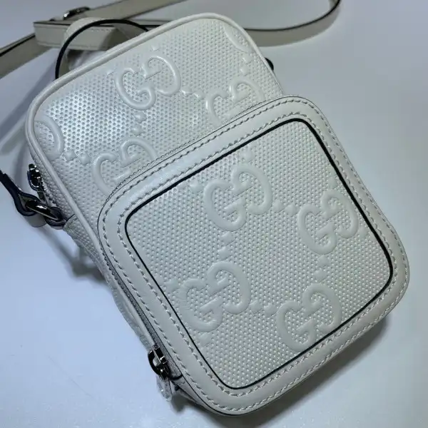 First bag ru GUCCI GG embossed mini bag