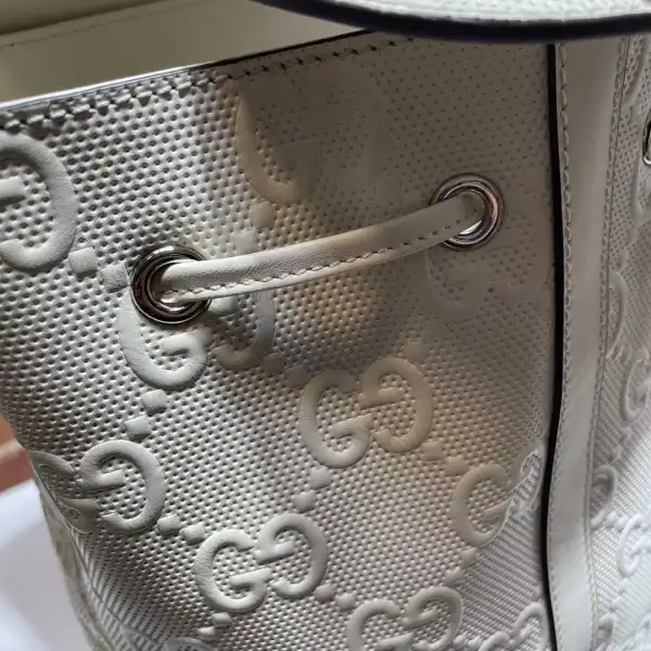 First bag ru GUCCI GG embossed backpack