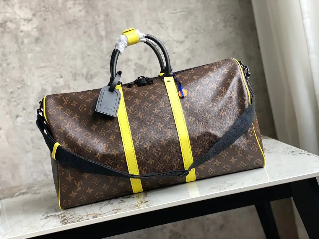 First bag ru LOUIS VUITTON KEEPALL BANDOULIÈRE 50