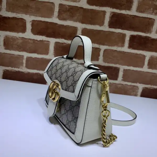 First bag ru GUCCI GG Marmont mini top handle bag