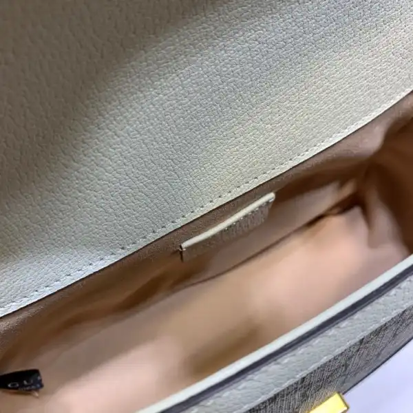 First bag ru GUCCI GG Marmont mini top handle bag