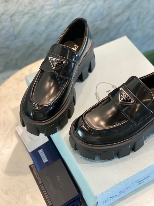 HOT SALE PRADA Brushed leather Monolith loafers