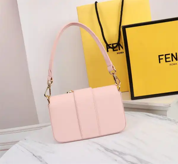 First bag ru FENDI Brooch mini baguette